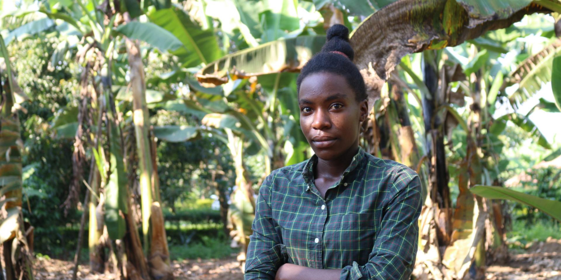 Woman standing in a plantation