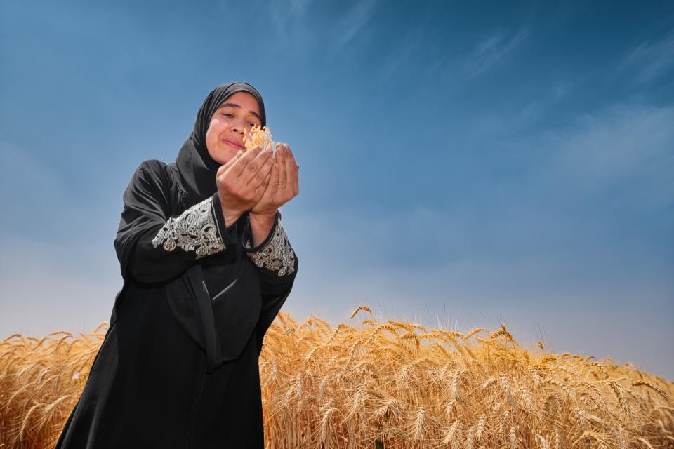 Woman farmer in paddy field