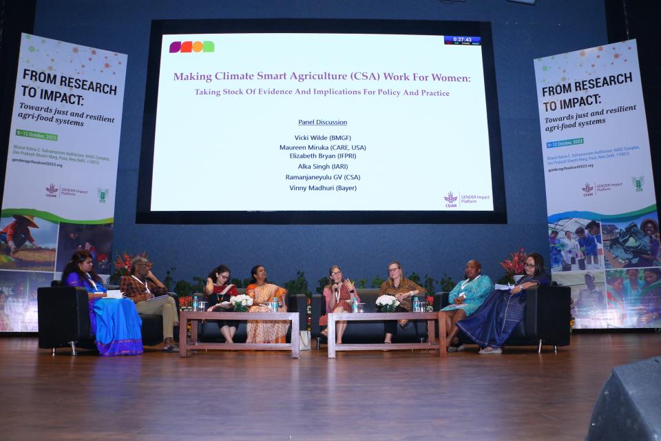 Conference panelists in discussion