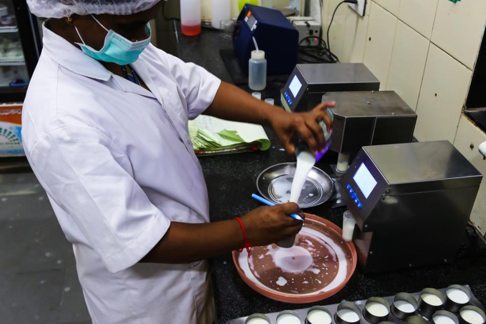 Man working on milk production