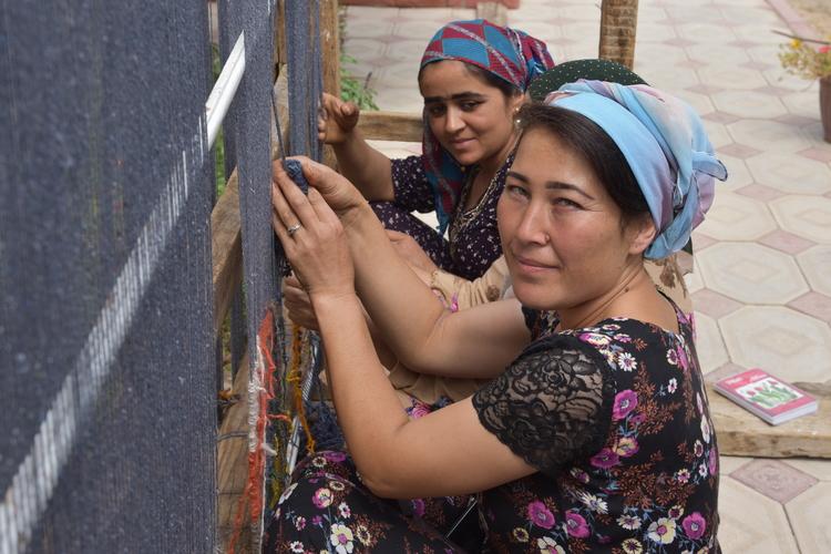 Rural women weaving carpets in Kashkadarya region, Uzbekistan